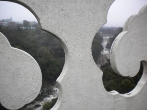 View of Falls Through Decorative Cutout in Bridge